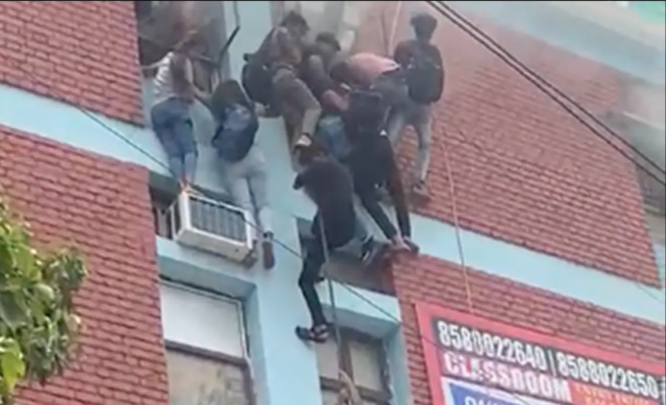 Delhi students slide down wires to escape coaching center fire 2023 7